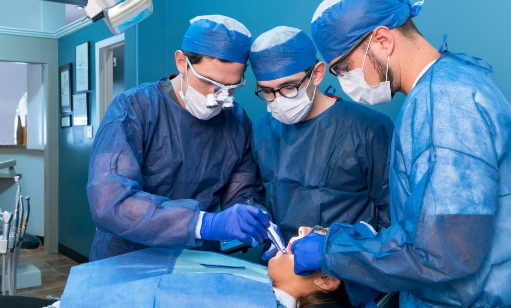 Doctors with an All on 4 patient.