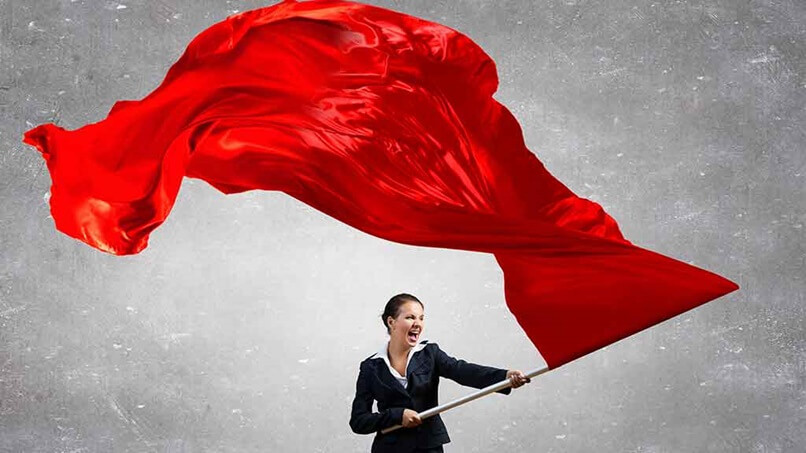 Woman holding red flag