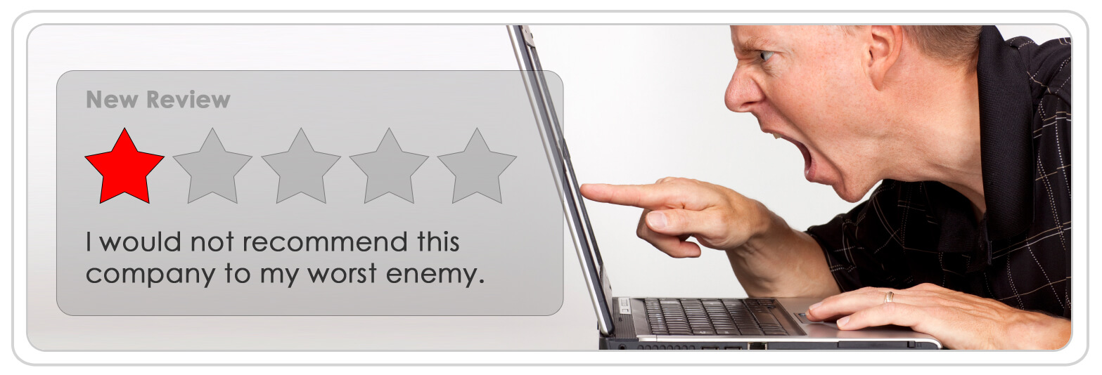 man shouting at computer writing a negative review